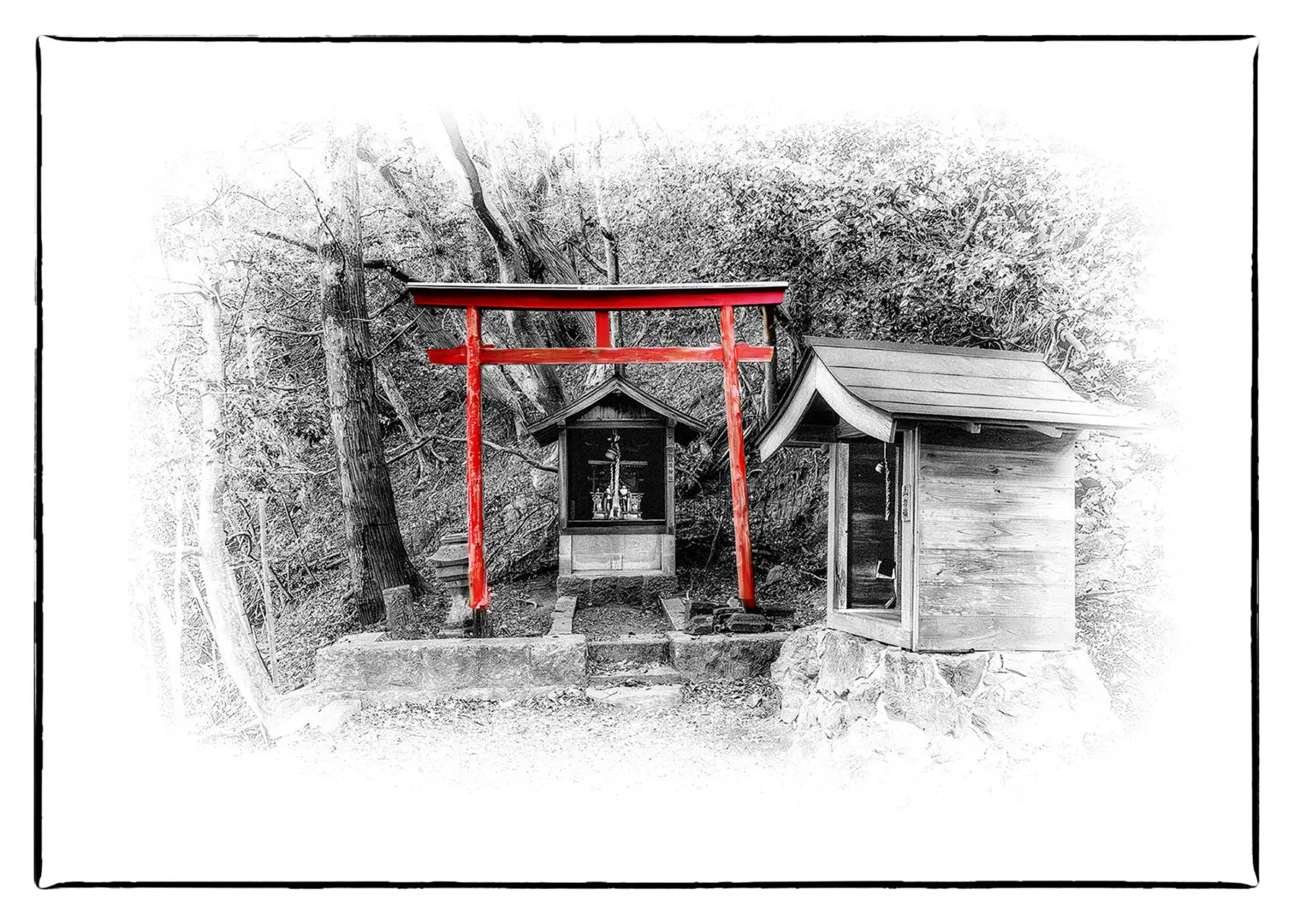 A red and white photo of a shrine in the woods.