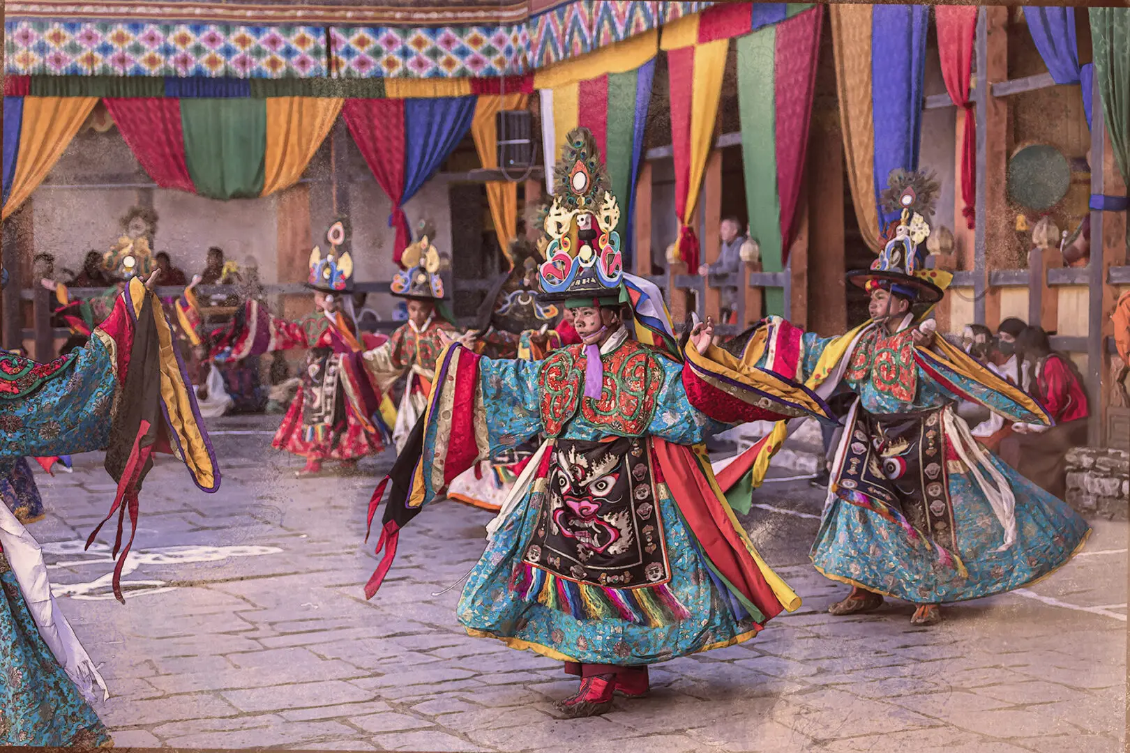 A group of people in colorful costumes dancing.